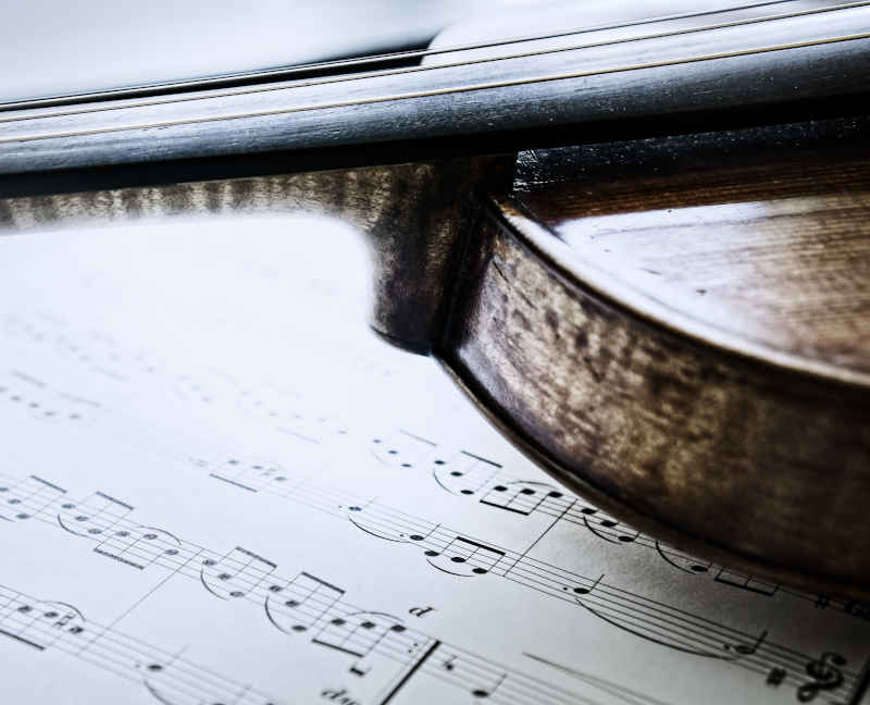 Photo of a violin with music